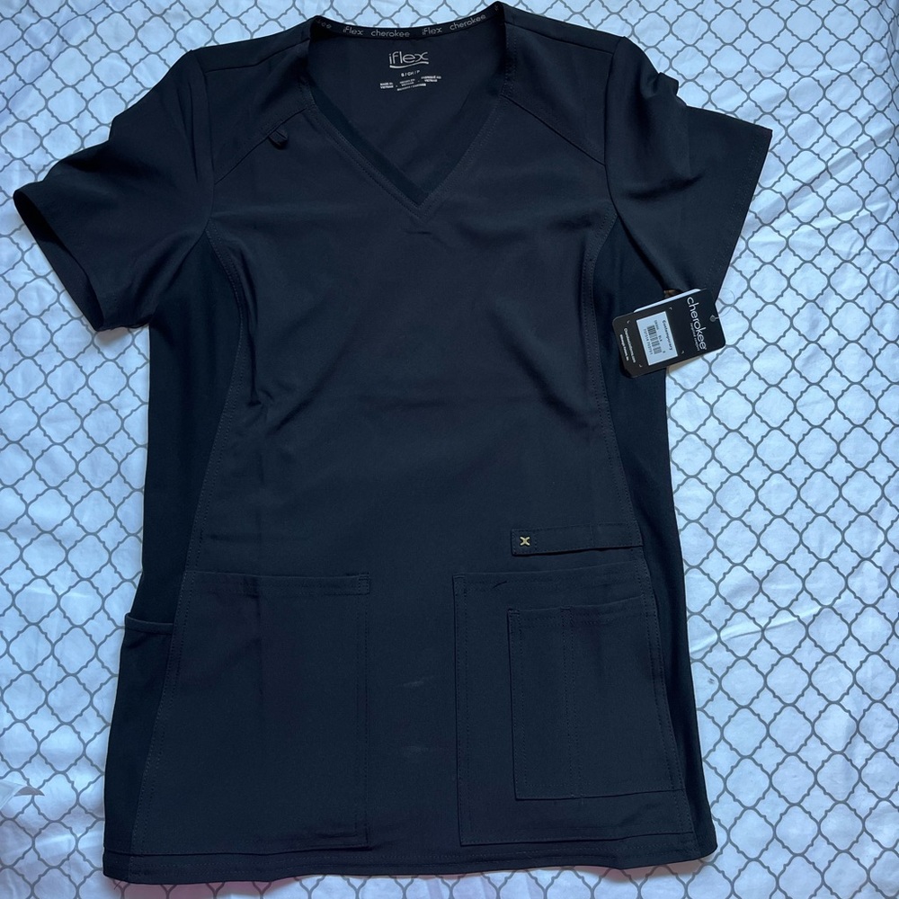 Cherokee iflex scrub top size SMALL. BRAND NEW WITH TAGS.